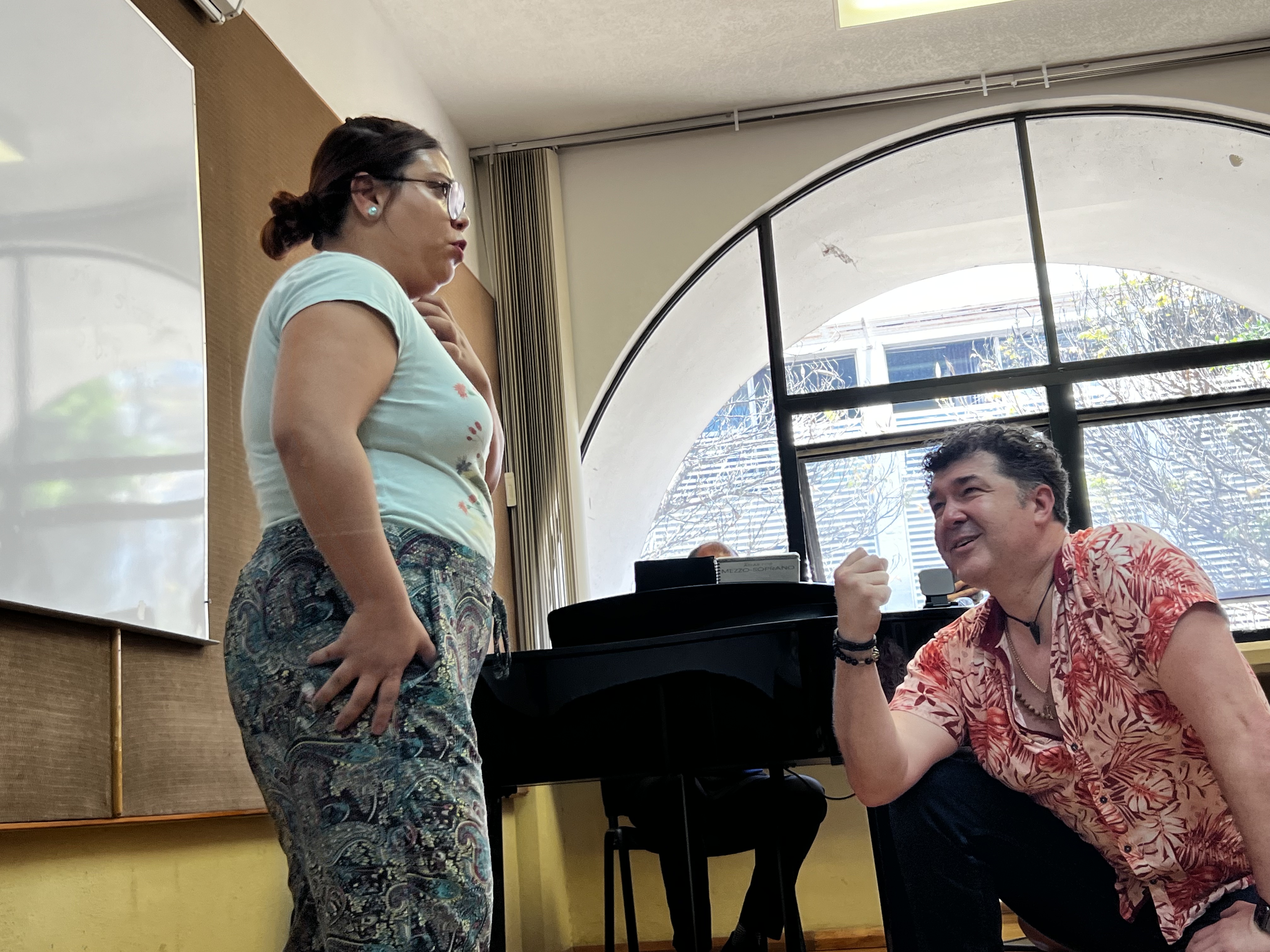 Luis Chapa working with a singer on alignment and breath